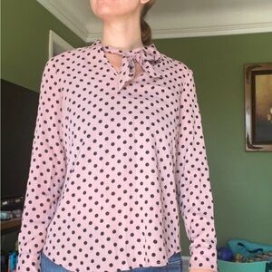 Small polka dot long sleeve blouse with tie.